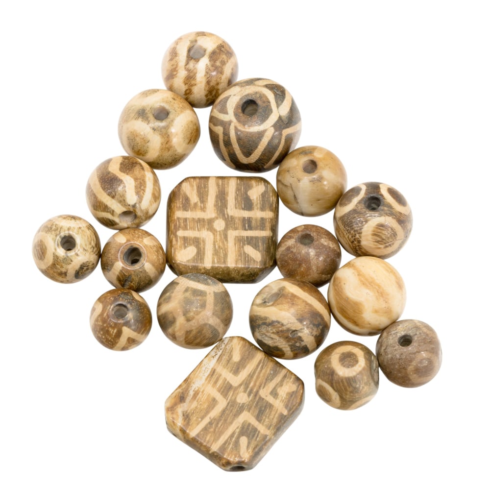 A group of pumtek beads: A group of pumtek beads. From 0.375" to 0.875" across.
