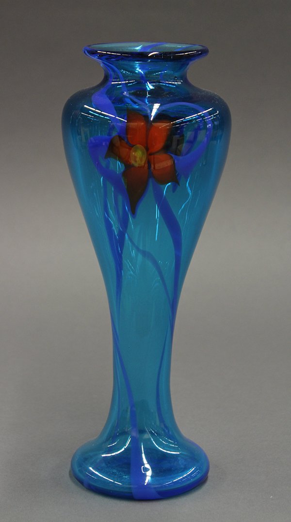 Richard Jolley art glass vase: Richard Jolley art glass vase, executed in 1979. Having a tapered body with rolled lip, accented with free floating red flowers and trailing royal blue sprays, rising on a circular base etched Richard