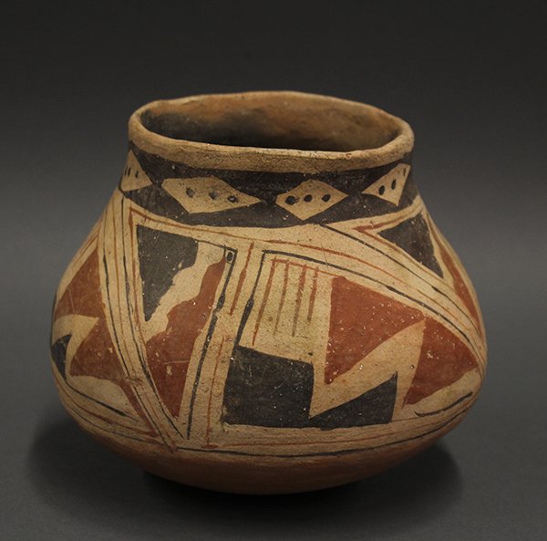 Casas Grandes Pre Historic jar: Casas Grandes Pre Historic jar, Southern Arizona or Northern Mexico circa 800 AD - 1200 AD, having a paint decorated border surrounding the geometric medallion, 2" x 5"