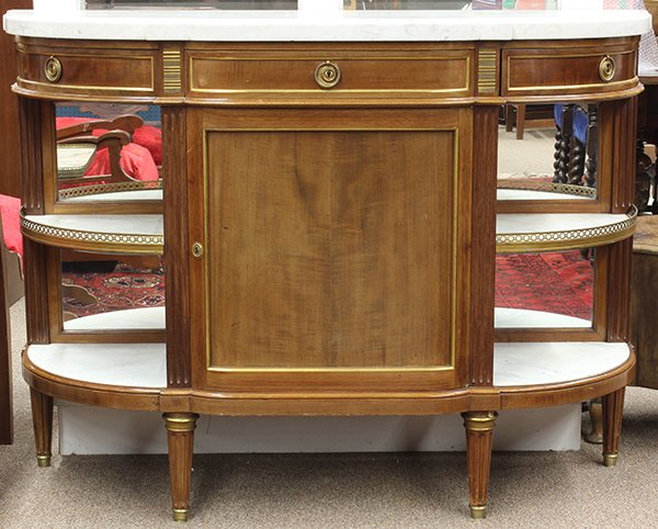 Louis XVI style marble top console dessertes: Louis XVI style marble top console dessertes, the shaped marble top above the three drawer case having ormolu banding flanking the central panel, the single door centering the marble top tiers and ris