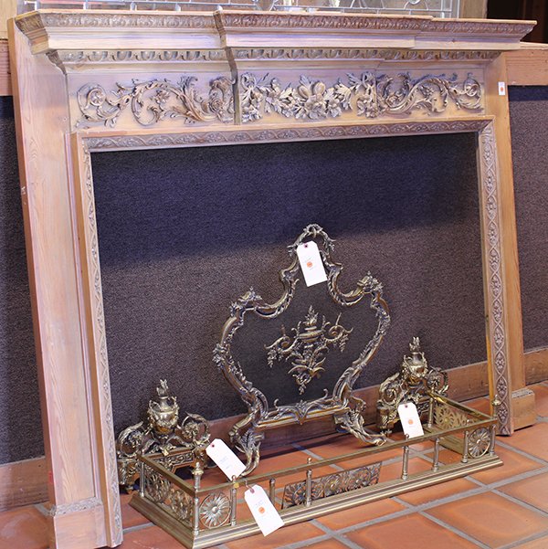 Federal style fireplace surround: Federal style fireplace surround, having an egg and dart border above the relief carved frieze with floral swags flanked by floral accented griffins surmounting the rosette decorated inner border, 57"