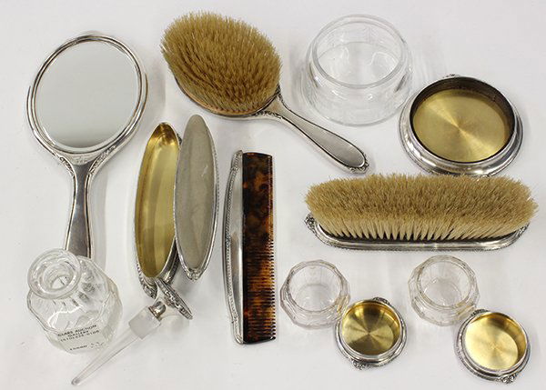 American Neo-Classical style dresser set: (lot of 10) American Neo-Classical style sterling silver mounted glass and tortoise shell dresser set, by R. Blackington & Company, 1862-1967, consisting of hair brush, hand mirror, comb, two jarlets,