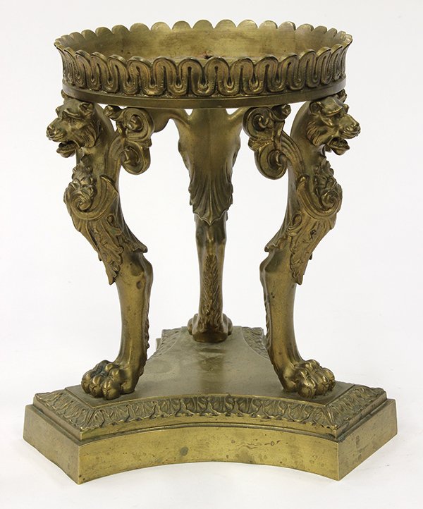 French, Louis XV style gilt metal stand: French Louis XV style patinated bronze stand, having three lion form supports rising on paw feet, terminating on a graduated base, 8.75"h