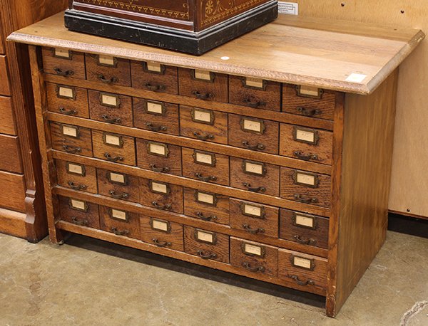 Oak 30 drawer file card system: Oak 30 drawer file card system, early 20th century, 23.5"h x 36"w x 16.5"d. Provenance: Property from the collection of Dr. Greg and Peggy Fleming Jenkins