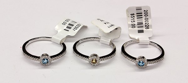 Citrine blue topaz pave diamond white gold stacking: (Lot of 3) Gemstone micro pavé and 14K white gold stacking rings including a ring set with (1) round cut citrine measuring approximately 2.70 mm, with full cut diamond accents totaling 0.22 ct., size