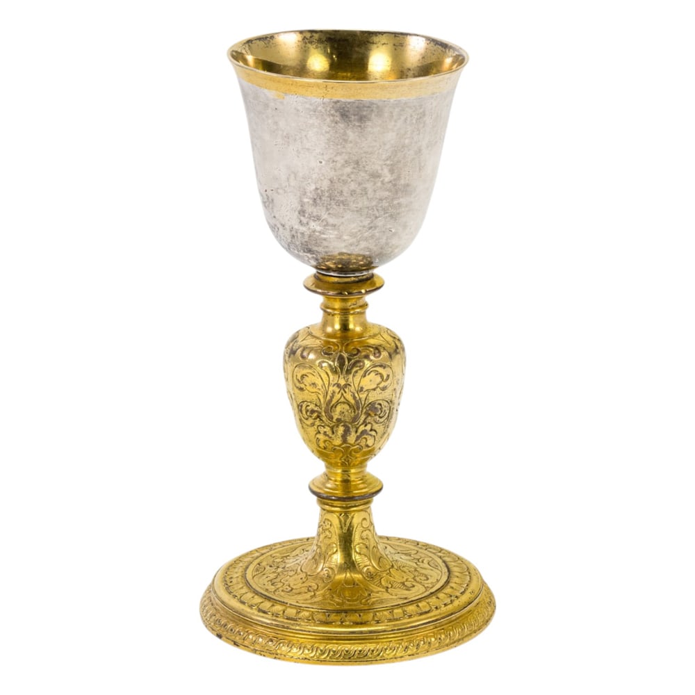 A European chalice with silver gilt cup: A European chalice with silver gilt cup, 19th century, raised on knopped stem and spreading foot, cup indistinctly hallmarked, 7.75"h x 4.25"dia