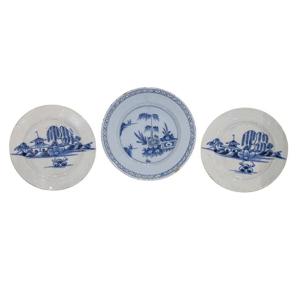 Three Delft blue and white pottery plates: Three Delft blue and white pottery plates, 18th/19th century, each unmarked, comprising a pair, 9"dia and a single, 10"dia. Property of a private collection, Presidio Heights, San Francisco