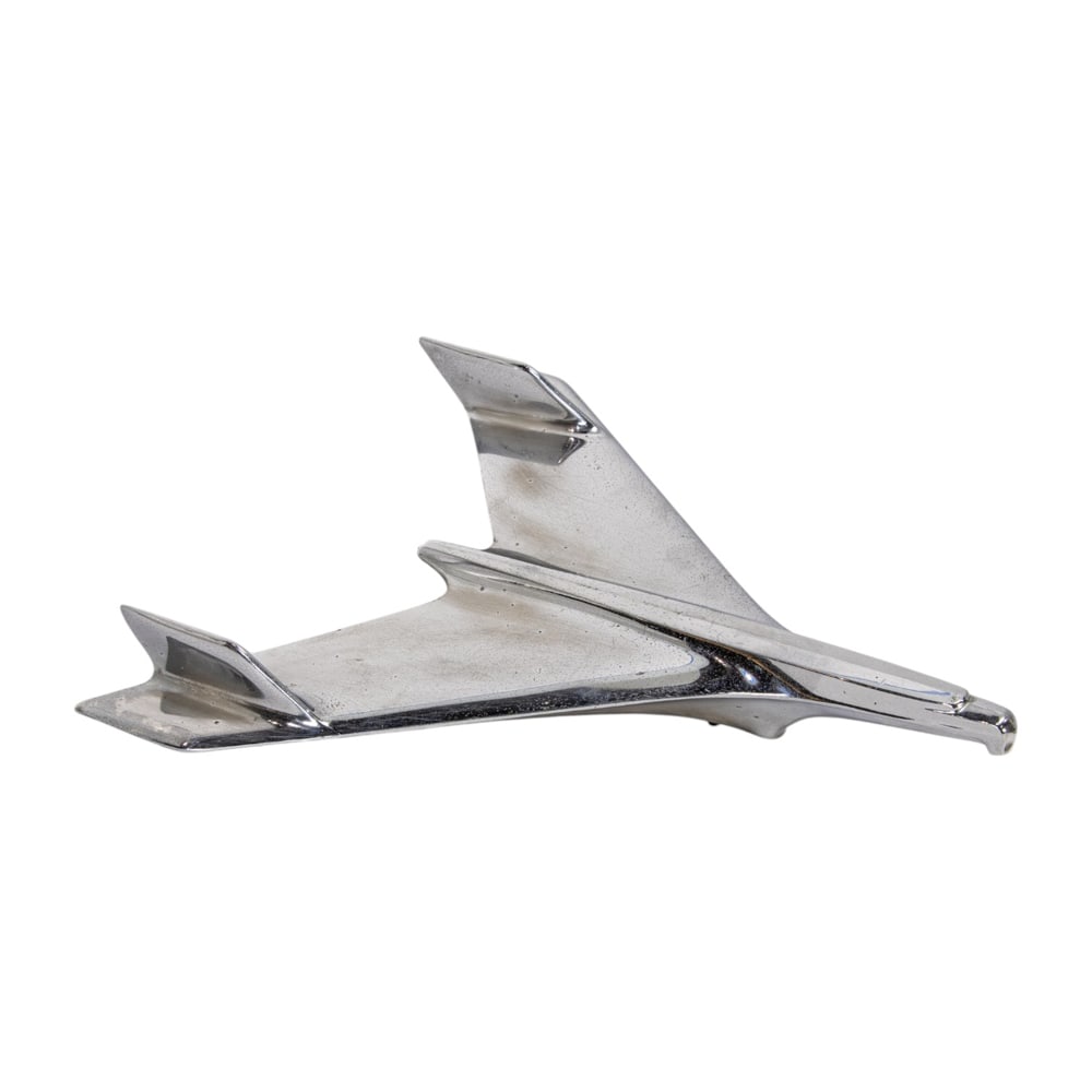 A chromed metal 'jet bird' hood ornament: A chromed metal 'jet bird' hood ornament, Chevrolet Bel Air, numbered '3731752', 14"l x 10.5"d