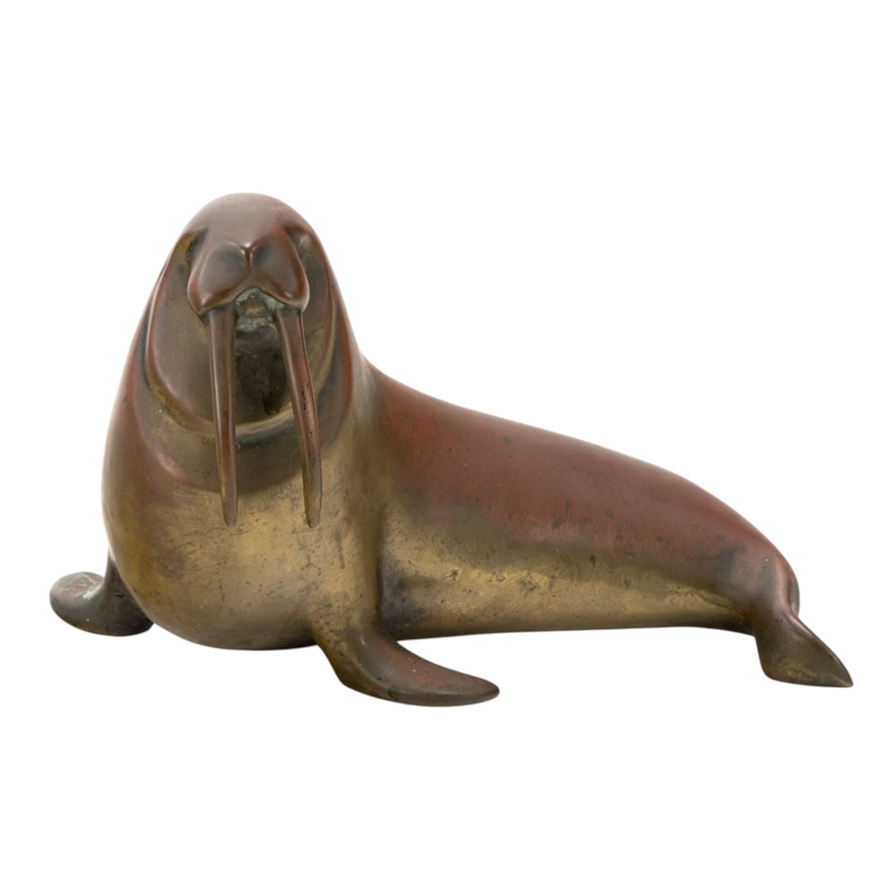 A bronze figure of a walrus after a model by Loet Vanderveen: A bronze figure of a walrus after a model by Loet Vanderveen, unsigned, 5"h x 7"l
