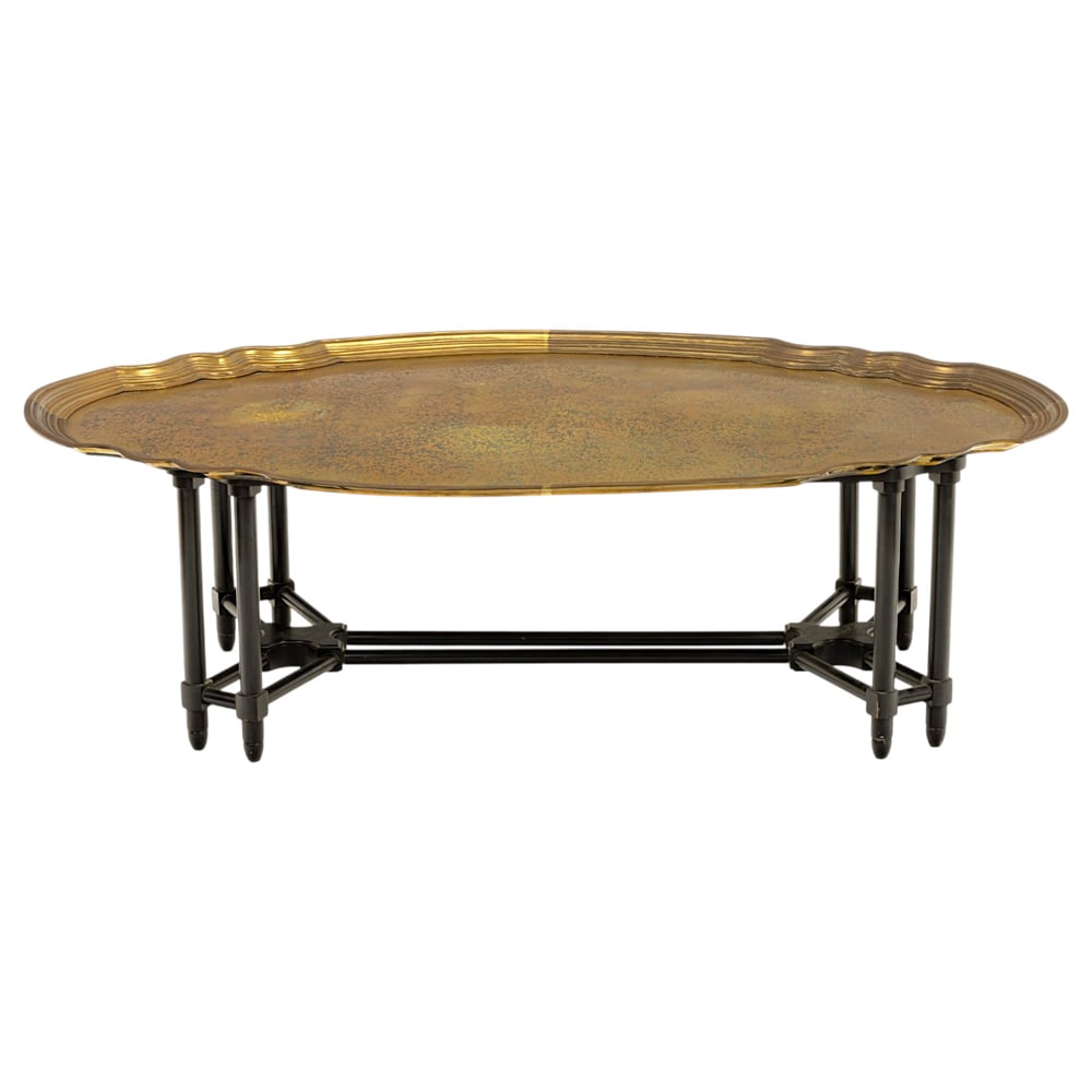 A contemporary acid etched brass tray on stand: A contemporary acid etched brass tray on stand, the large form with a graduated border and resting on a faux bamboo stand, 17"h x 55"w x 32"d. Property of a private collection, Presidio Heights, San F