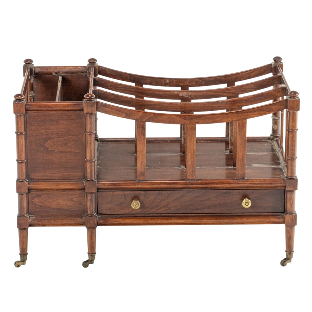 A Georgian style mahogany canterbury: A Georgian style mahogany canterbury, with a single drawer and rising on turned legs terminating on casters, 9"h x 30"w x 17"d. Property of a private collection, Presidio Heights, San Francisco
