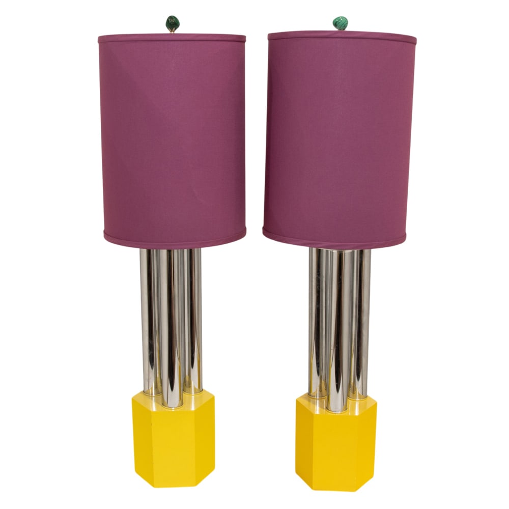 A pair of Kovacs chrome and wood lamps: A pair of Kovacs chrome and wood lamps, mid 20th century, each with triple rod standard on hexagonal plinth, 19"h (excluding electrical fittings); 34"h (overall)