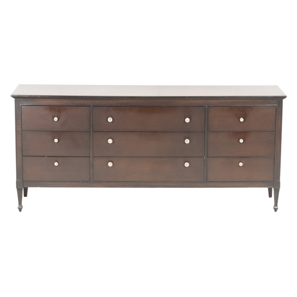 A contemporary chest of drawers: A contemporary chest of drawers, in dark brown with silver tone hardware, fitted with arrangement of nine drawers, 32"h x 72"w x 19"d