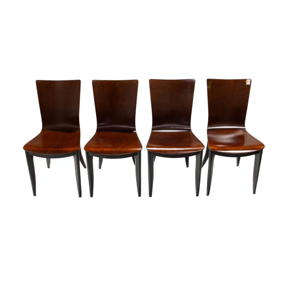 A set of four Leland International laminated sidechairs: A set of four Leland International laminated sidechairs, each with bent plywood seat and back supported by the metal base, 34.5"h x 18.5"w x 20.5"d (overall); 18.5"h x 16.5"d (seat)