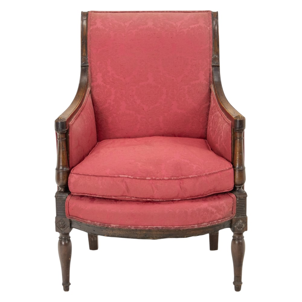 A Neoclassical style red damask upholstered armchair: A Neoclassical style red damask upholstered armchair, 33.5"h x 24"w x 25"d; 19"h x 18"d (seat). Property of a private collection, Presidio Heights, San Francisco
