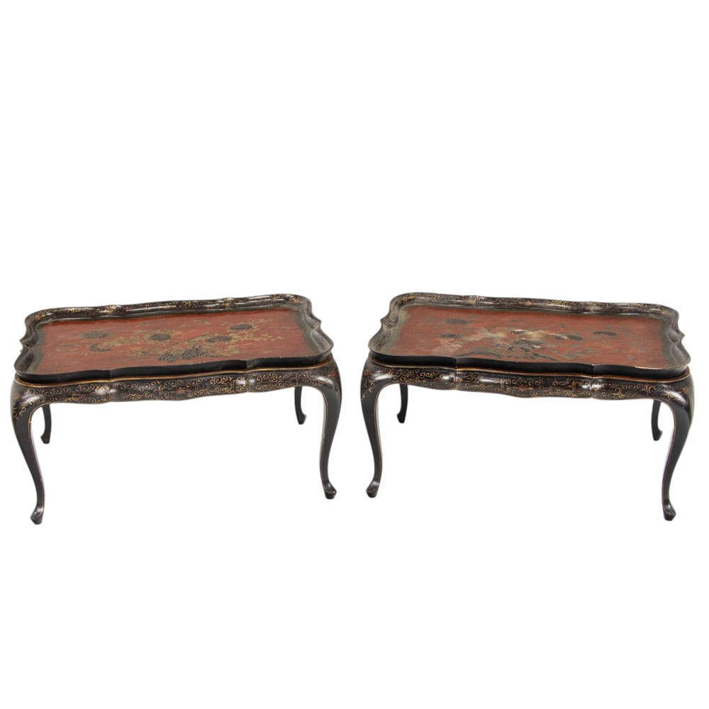 A set of two English Chinoiserie decorated trays on stand late19th century: A set of two English Chinoiserie decorated trays on stand late19th century, each with a lift off crimson tray with floral and fauna sprays, resting on the partial gilt ebonized base with floral
