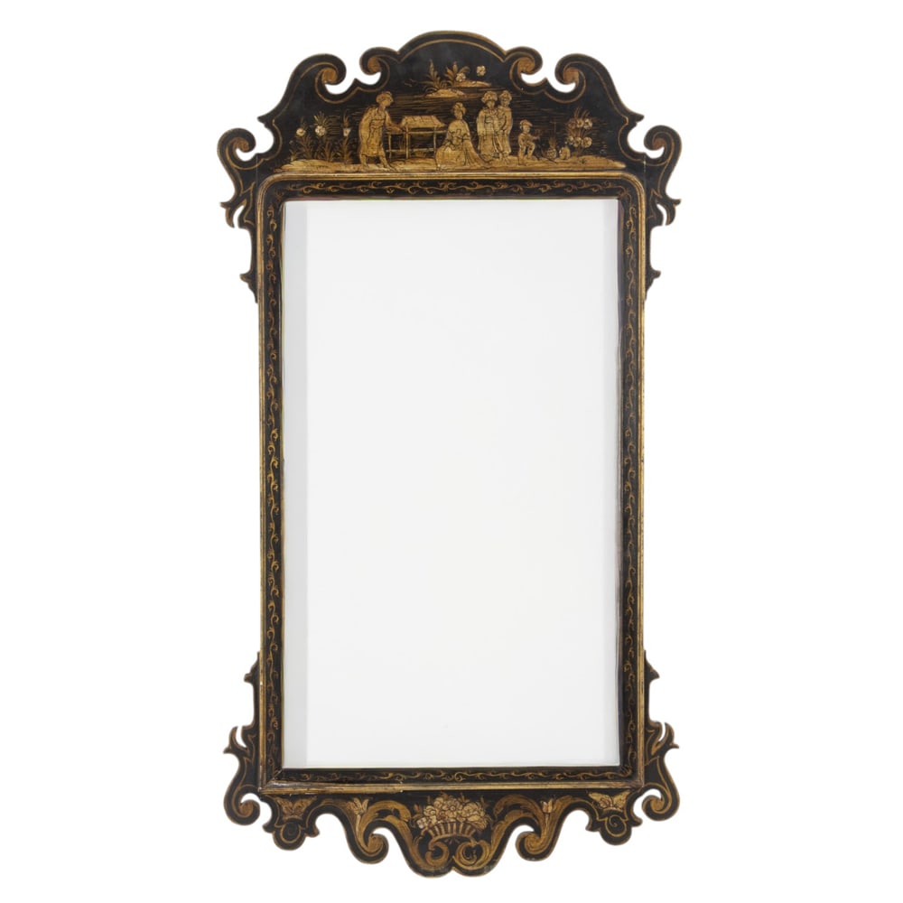 An Italian Chinoiserie style mirror: An Italian Chinoiserie style mirror, first half-20th century, decorated with figures and flowers on an ebonized ground, applied label 'Made in Italy', 44.5"h x 24"w. Property of a private collection,