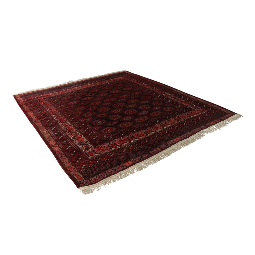 An Afghan Bokhara carpet: An Afghan Bokhara carpet, 10'8" x 10'4"