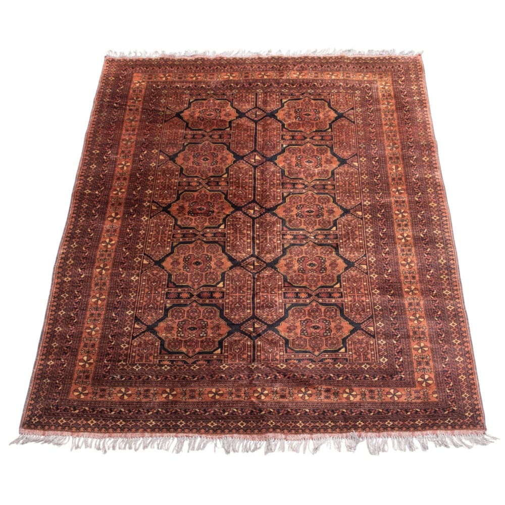 An Afghan carpet: An Afghan carpet, 9'9" x 6'8"
