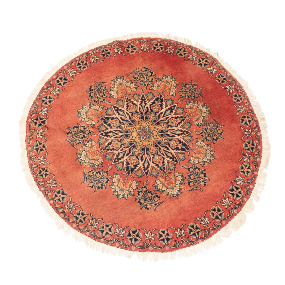 A Persian circular carpet: A Persian circular carpet, 3'6" dia