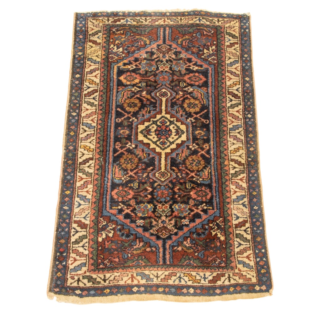 A Persian runner: A Persian runner, 3'10" x 2"4. Property of a private collection, Presidio Heights, San Francisco