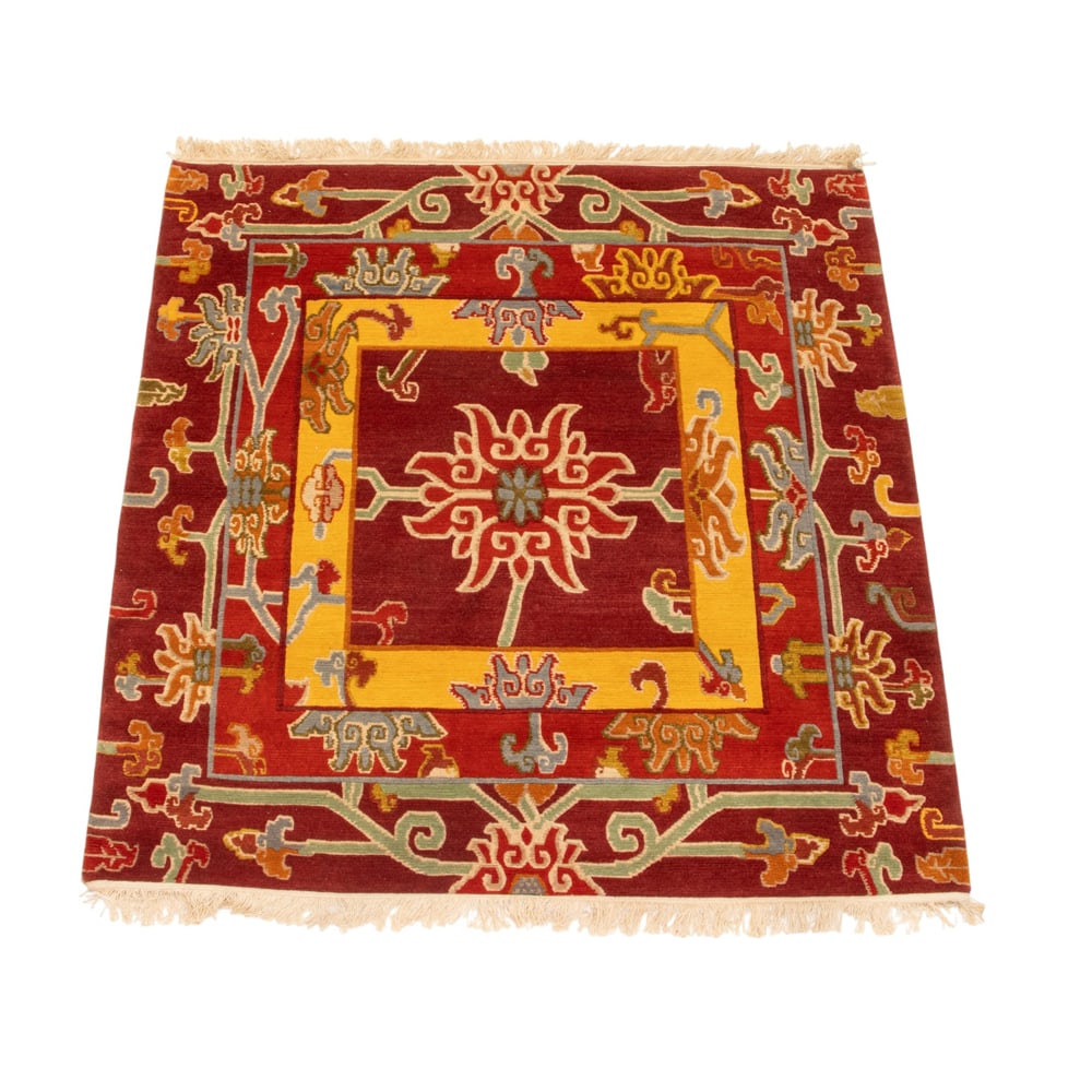 A Nepalese carpet: A Nepalese carpet, 3'4" square