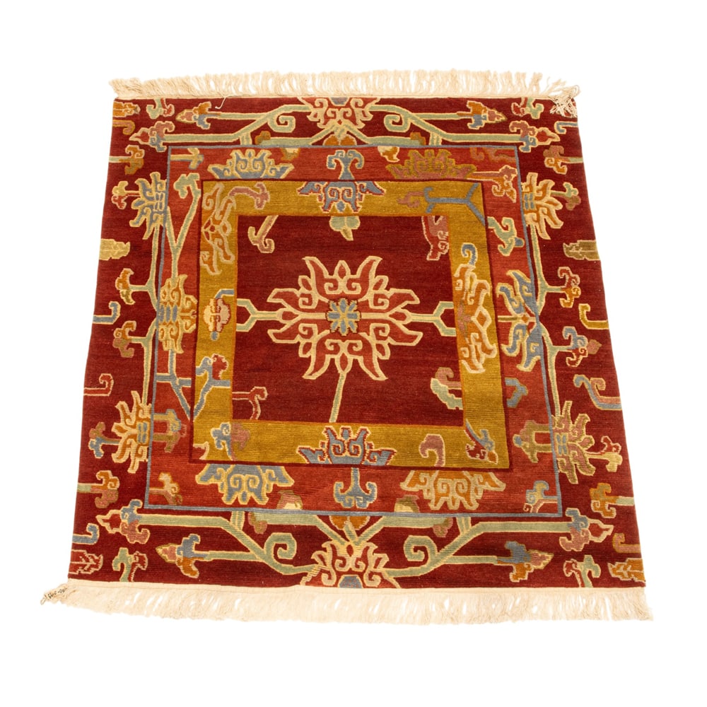 A Nepalese carpet: A Nepalese carpet, 3'4" square