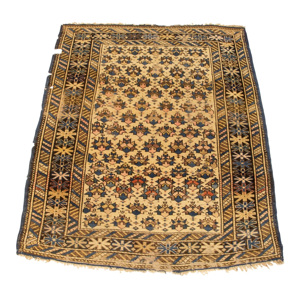 A Caucasian carpet: A Caucasian carpet, 3'10" x 4'8"
