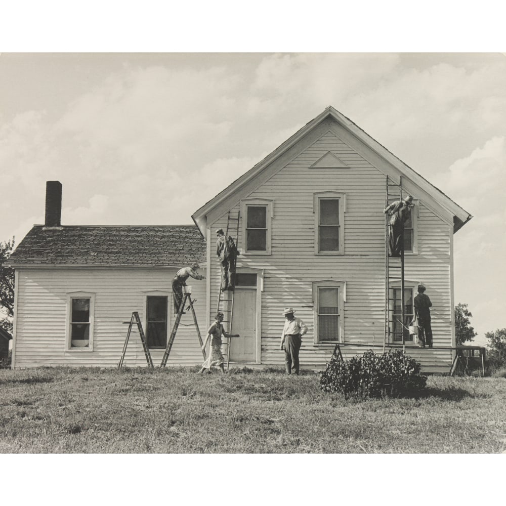 Photograph, Dorothea Lange: Dorothea Lange (American, 1895-1965), Untitled (Painting a House), gelatin silver print, unsigned, sheet: 11"h x 14"w, overall (laid down to paper backing, unframed): 11"h x 14.5"w. Provenance: