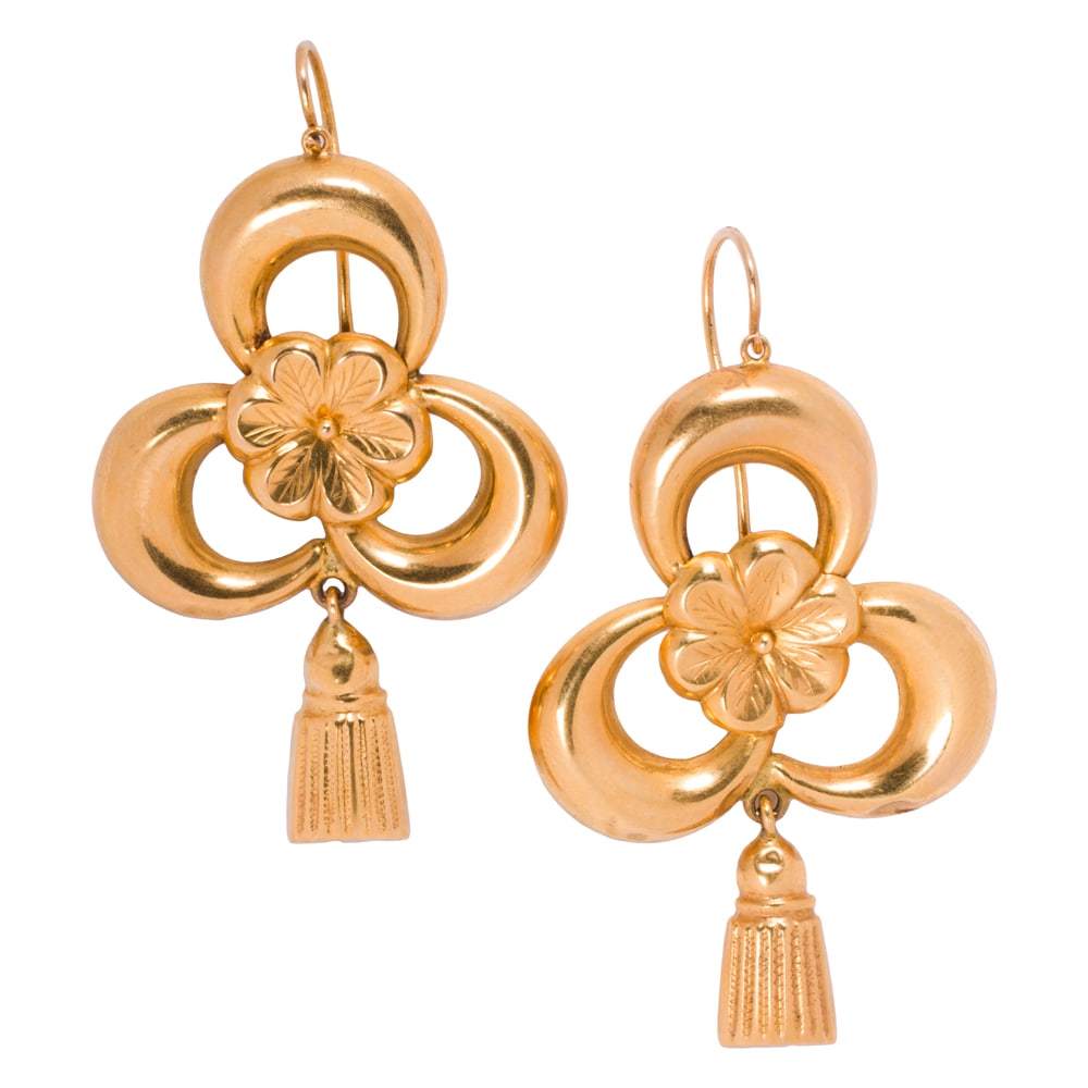 A pair of antique 18k gold earrings: A pair of antique 18k gold earrings Designed as hollow-form clovers, accented by tassel charms; length: 2 in; 5.65 grams