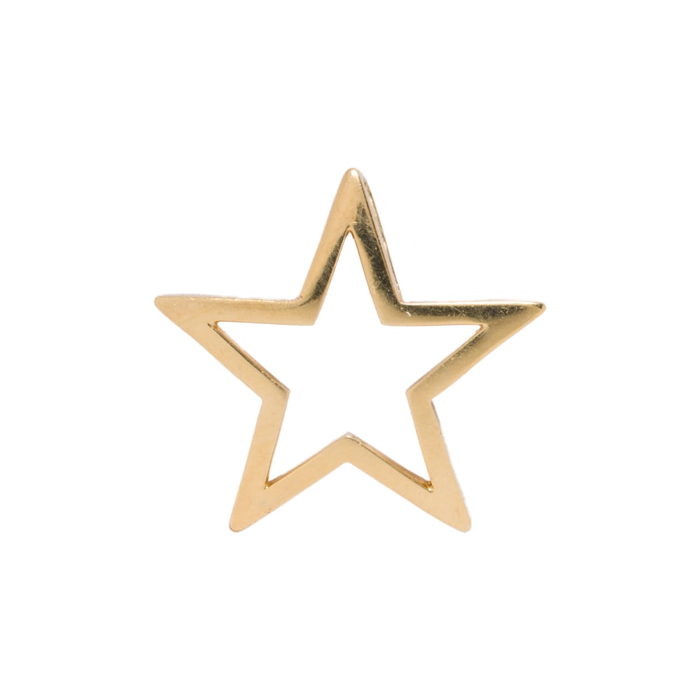 A Roberto Coin ruby and 18k gold pendant: A Roberto Coin ruby and 18k gold pendant Designed as a star, the verso set with one round-cut ruby; length: 7/8 in; 2.20 grams