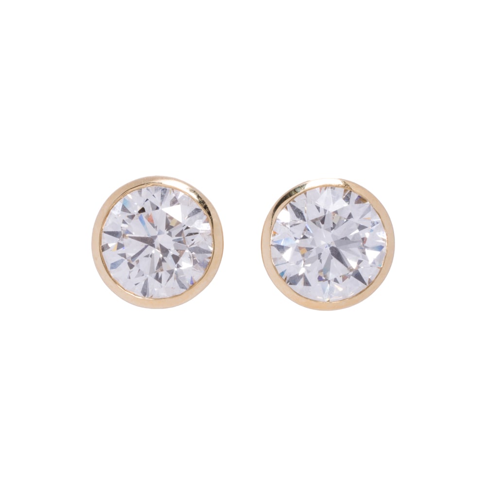 A pair of lab grown diamond stud earrings: A pair of lab grown diamond stud earrings Featuring round brilliant-cut lab grown diamonds weighing 2.05 carats each; 4.30 grams Accompanied by IGI laboratory grown diamond report no.: LG759520987