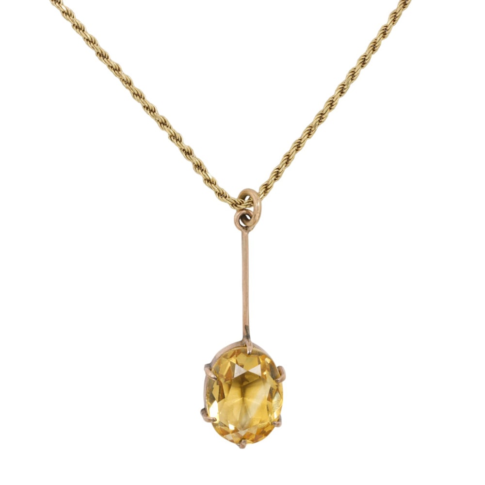 An antique citrine, 9k gold, and gold-filled pendant necklace: An antique citrine, 9k gold, and gold-filled pendant necklace The gold-filled pendant set with one oval-cut citrine measuring 14.08 x 10.31 x 6.26 mm, on 9k gold rope chain; pendant length: 1 3/8 in;