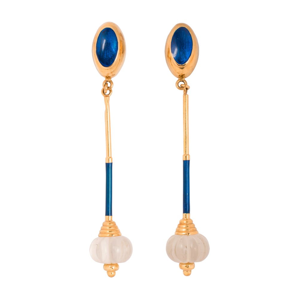 A pair of Gaston Lebo enamel, rock crystal and 18k gold ear-clips: A pair of Gaston Lebo enamel, rock crystal and 18k gold ear-clips The drop earrings featuring lobed rock crystal beads, accented by blue enamel with blue enamel surmount; length: 3 1/2 in; 23.30 grams