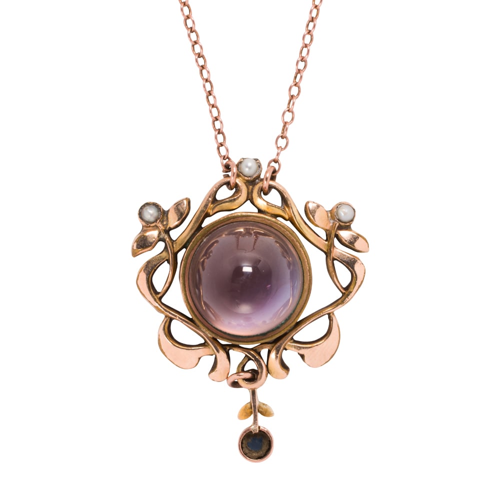 An antique rainbow moonstone, sapphire, seed pearl, 9k gold, and gold-filled necklace: An antique rainbow moonstone, sapphire, seed pearl, 9k gold, and gold-filled necklace The gold-filled pendant centering a round-shaped rainbow moonstone cabochon measuring approximately 11.28 x 10.14