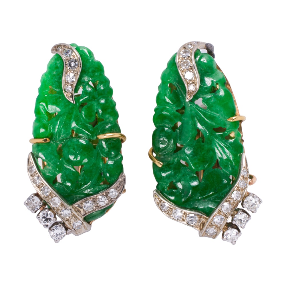 A pair of jade, white sapphire, and 14k gold ear-clips: A pair of jade, white sapphire, and 14k gold ear-clips Designed with carve jade tablets, accented by white sapphire mounting; estimated total sapphire weight: 0.60 carat; length: 1 1/8 in; 10.80 grams