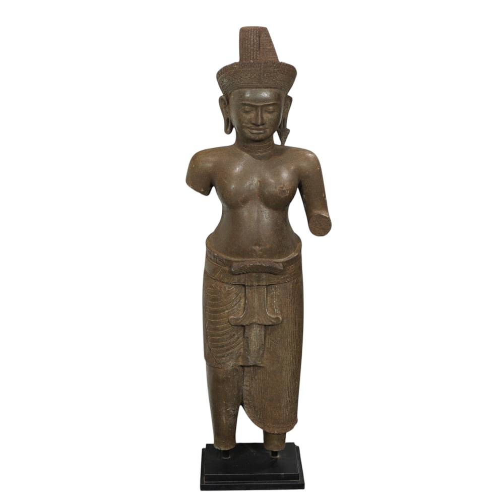 An Angkor Wat style stone figure of male Hindu divinity: An Angkor Wat style stone figure of male Hindu divinity. 43" including the stand. Provenance: purchased in Cambodia, February 2023