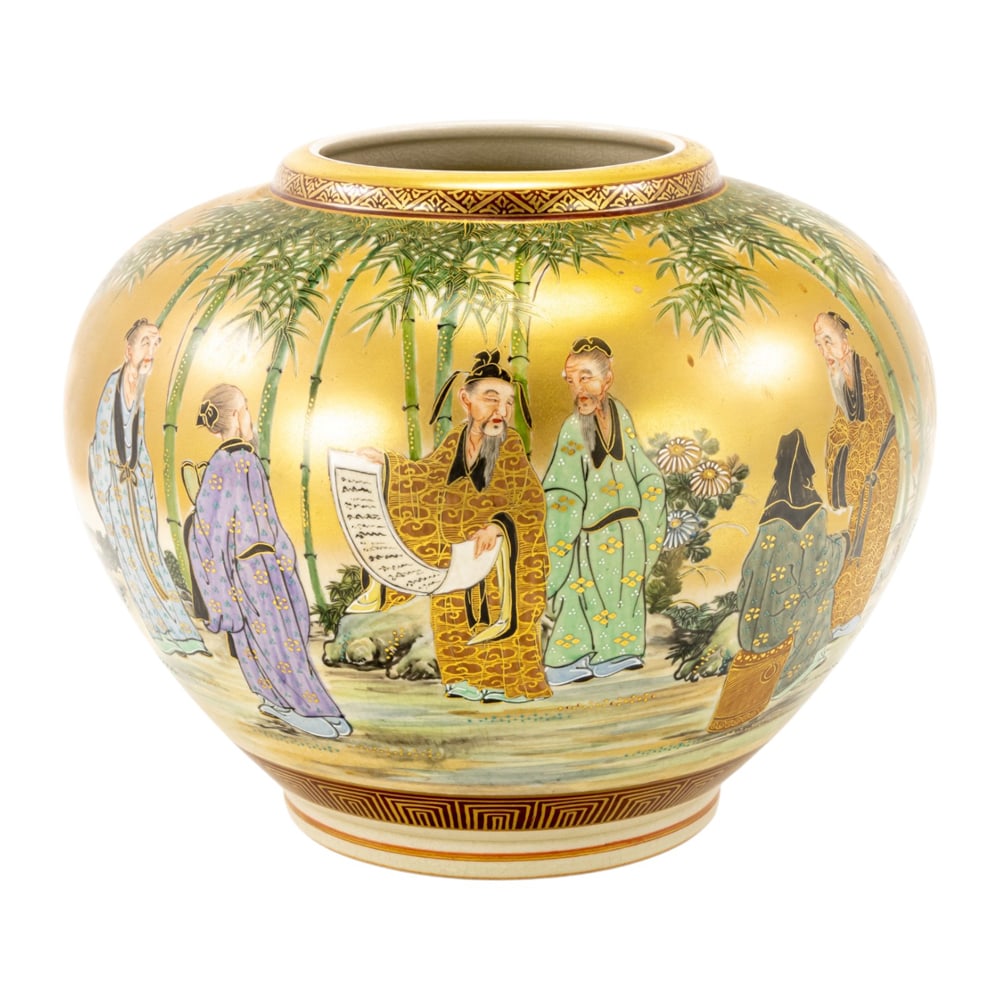 A Japanese Satsuma vase: A Japanese Satsuma vase. Painted with a continuous scene of elderly scholars gathering in the garden setting, Meiji period, 9.5" high.