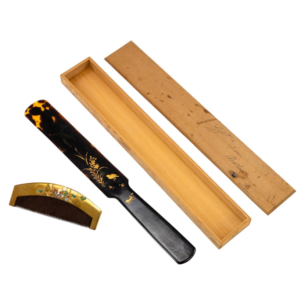 (lot of 2) Japanese lacquer objects: (lot of 2) Japanese lacquer objects. Comprising a comb with two elderly figures under a tree, and a letter opener with birds and flowers, 19th century, 3.875" wide and 10.375" long.