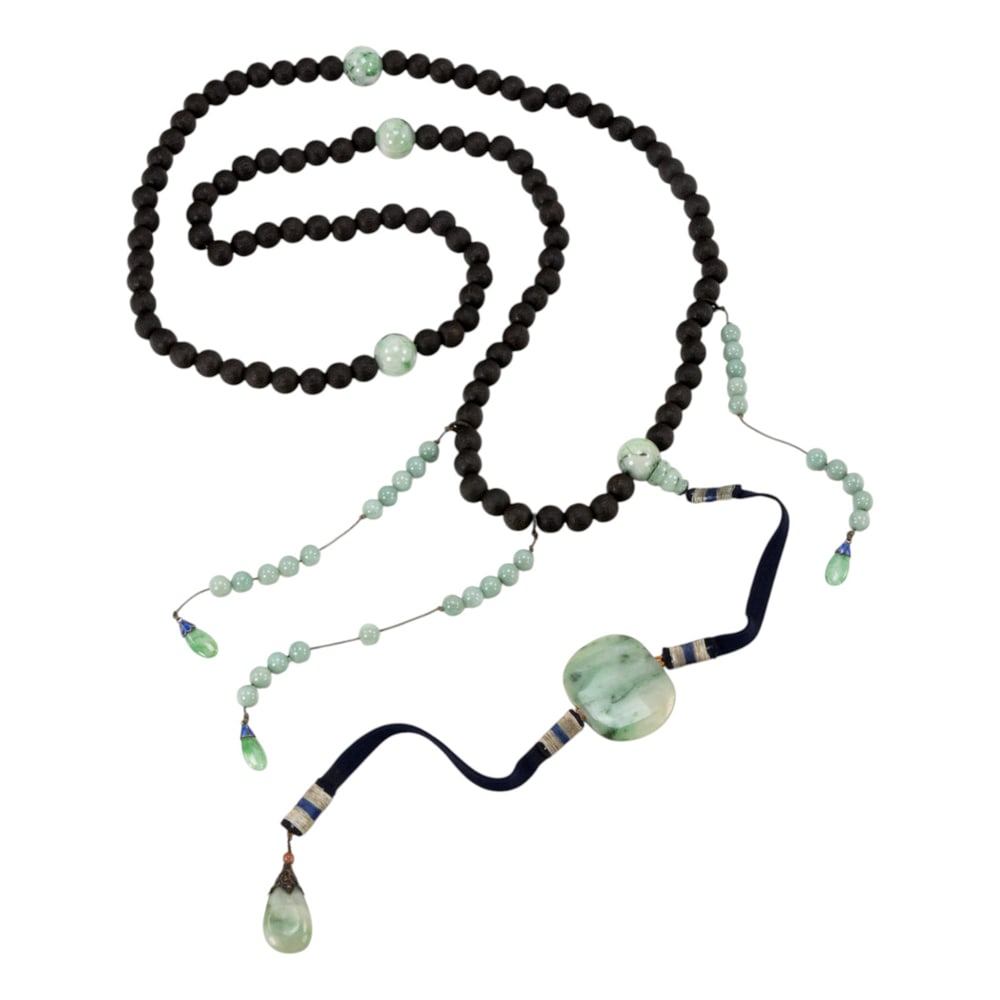 A Chinese jadeite and aloeswood court necklace (1 of 3)
