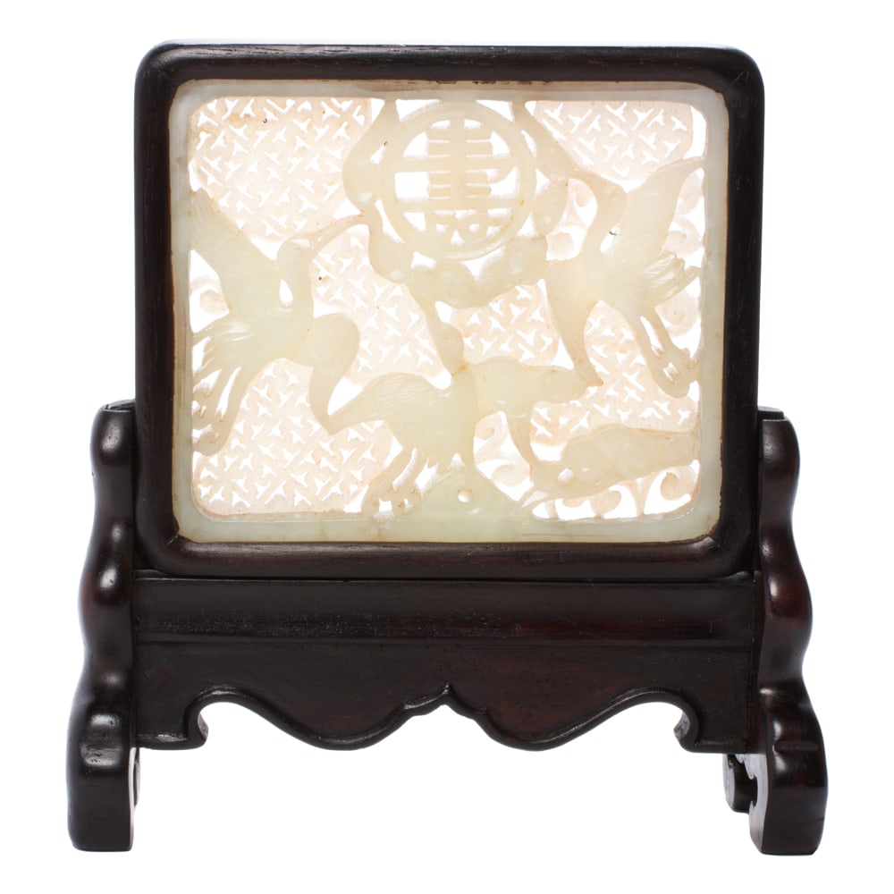 A Chinese white jade 'crane' plaque (1 of 3)