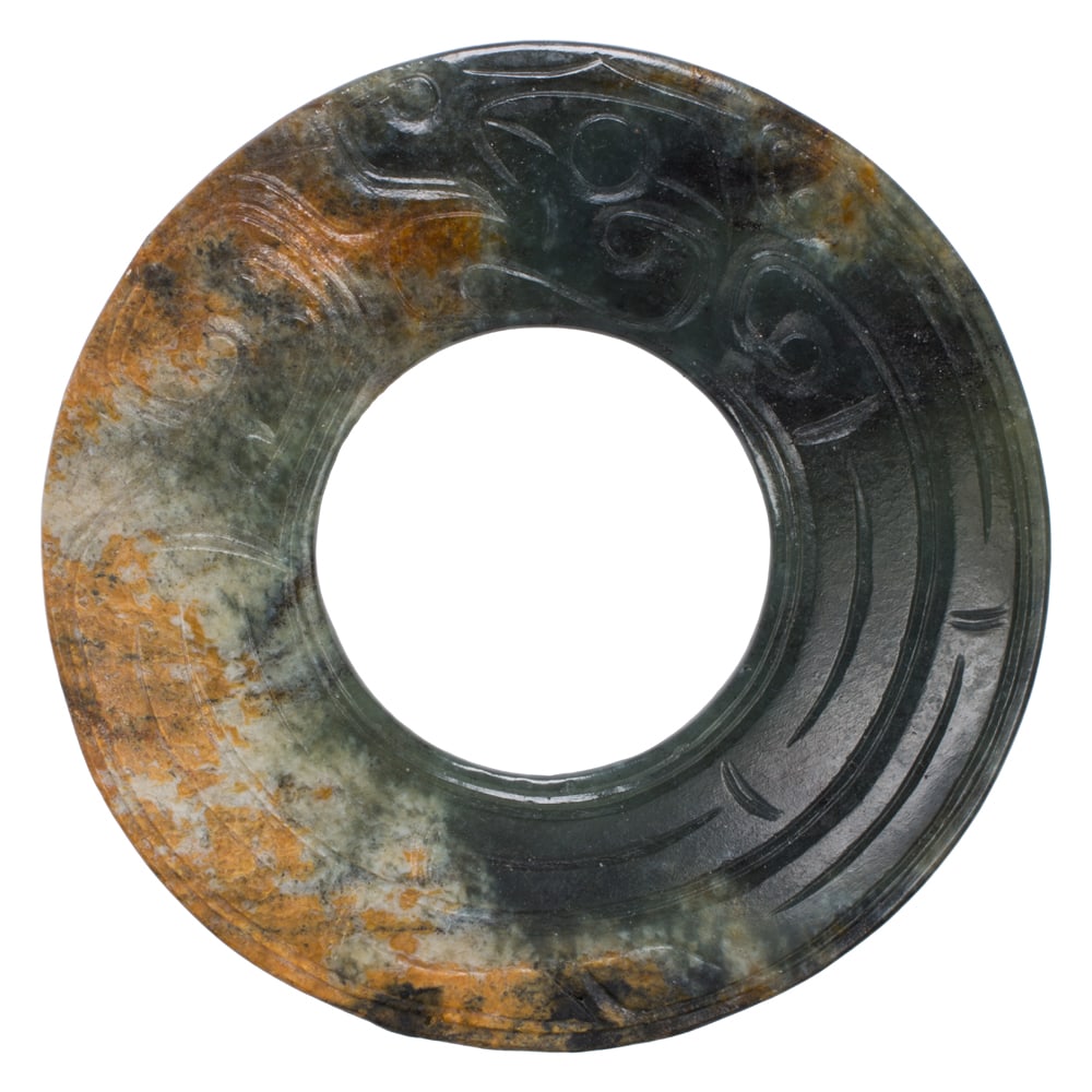 A Chinese mottled jade bi disc (1 of 2)