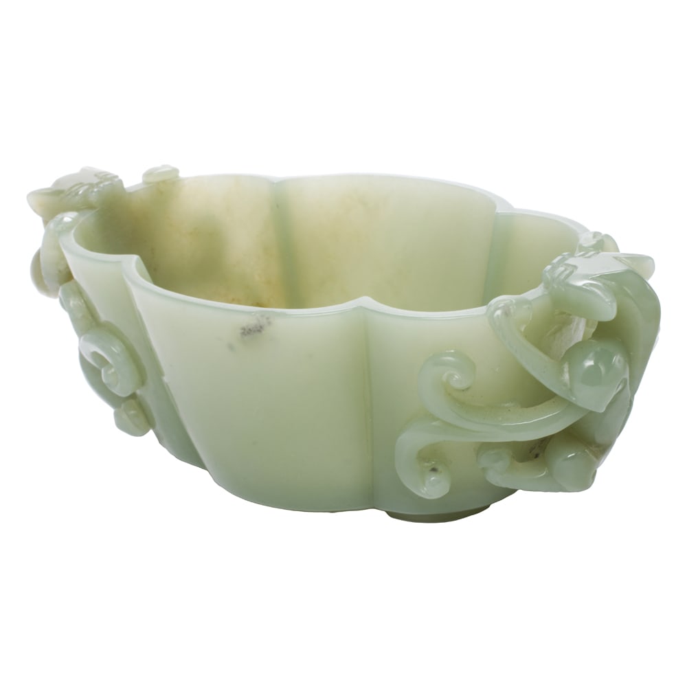 A Chinese celadon jade libation cup (1 of 3)