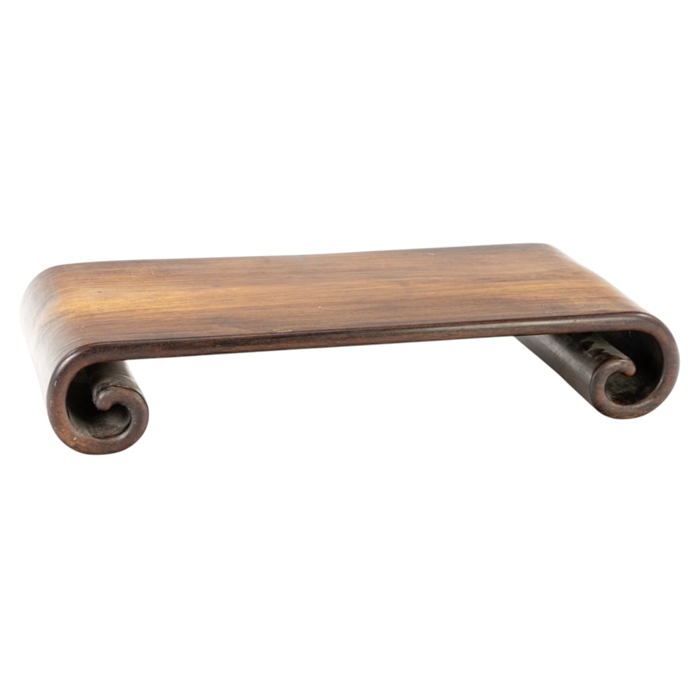 A Chinese rosewood scroll-form stand (1 of 3)