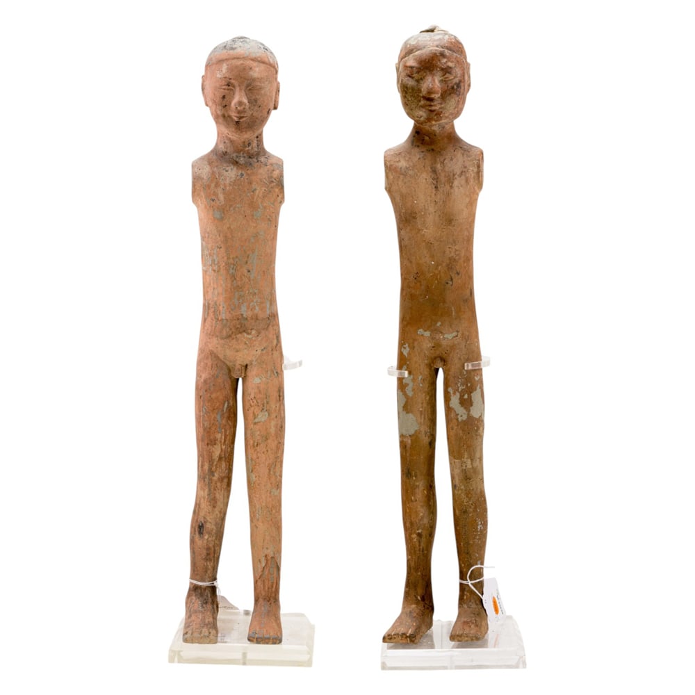 A Chinese Han dynasty pottery figure with stand (1 of 4)