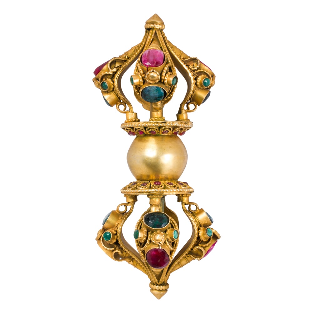 A Tibetan gilt bronze vajra with gemstone inlay (1 of 2)