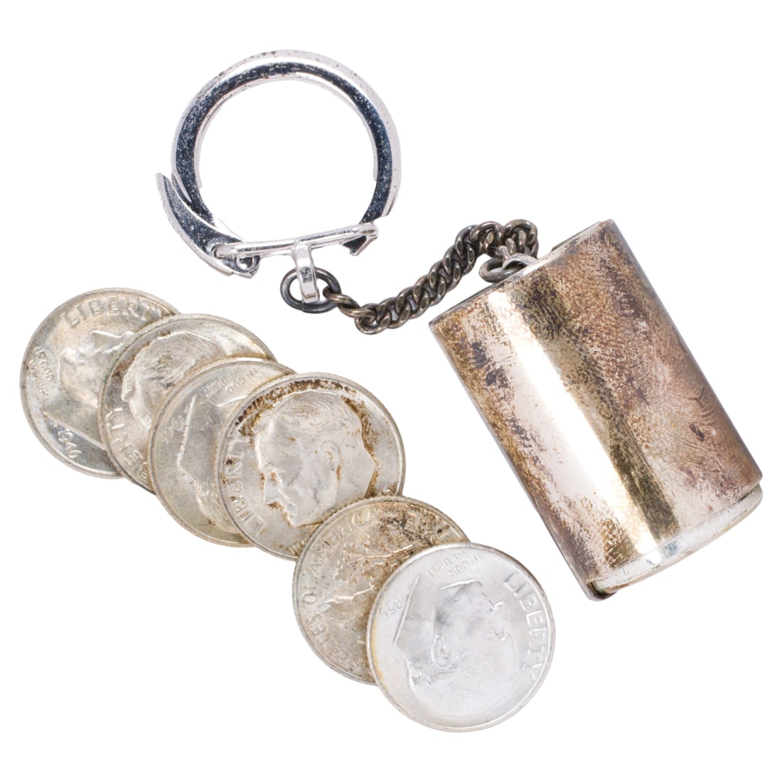 A Tiffany and Company sterling silver tollkeeper: A Tiffany and Company sterling silver tollkeeper designed as a polished cylinder; length: 1 1/8 in; 19.90 grams; accompanied by original box