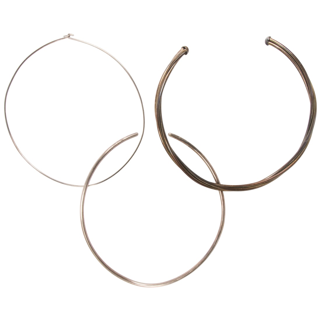 Three silver collar necklaces: Three silver collar necklaces interior circumferences: all 16 in; 64.00 gross grams