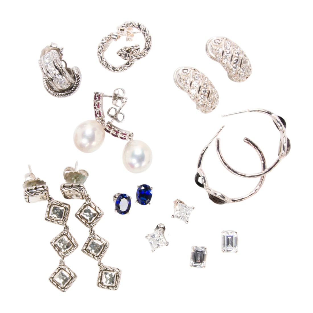 Nine pairs of sterling silver earrings: Nine pairs of sterling silver earrings The earrings set with various hardstones; gross weight: 58.60 grams