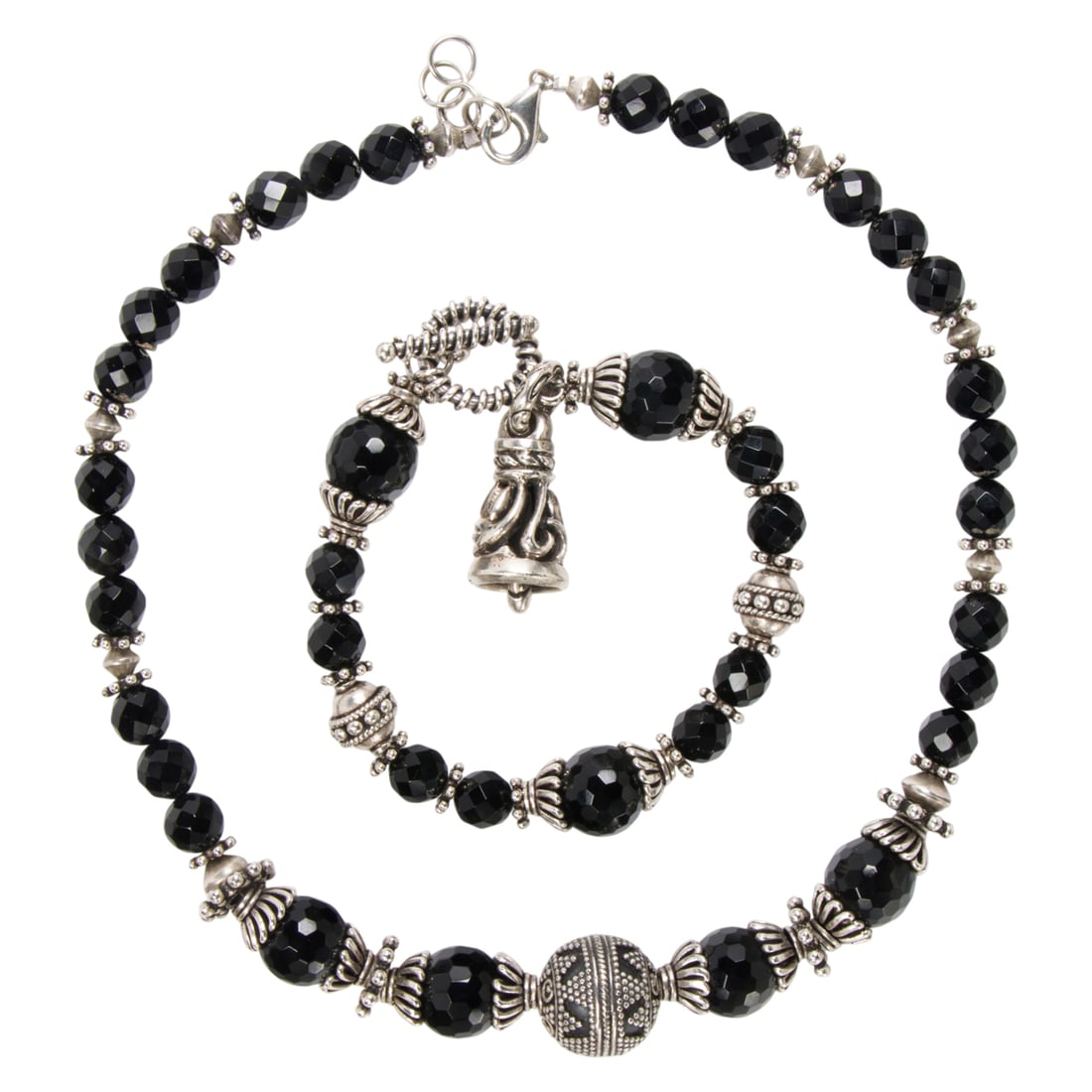 A glass and sterling silver bracelet and necklace set: A glass and sterling silver bracelet and necklace set The necklace and bracelet featuring faceted black glass beads; gross weight: 98.20 grams